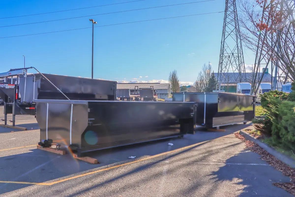 Roll-off dumpster ready for waste disposal at job site for Cleanout Dumpster Rental in Boxford